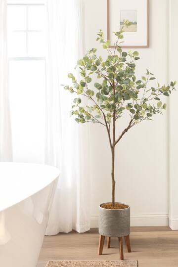 Kate and Laurel 6ft. Eudora Faux Eucalyptus Tree in Gavri Wood & Metal Planter